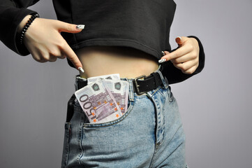Euro banknotes in pocket, win.