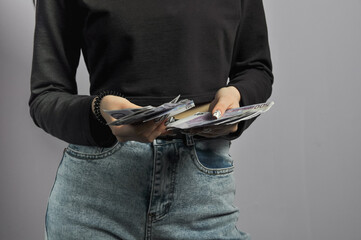 Euro banknotes in the hands of a girl