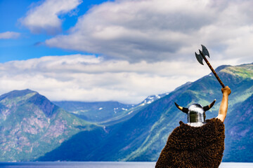 Viking warrior on fjord shore, Norway