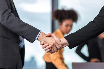 Business people shaking hands. Businessman shaking hands during a meeting in the office