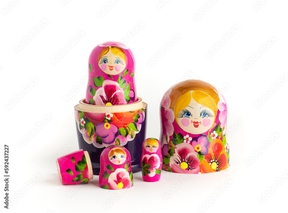 Wall mural Russian Matryoshka Dolls in different sizes. Traditional Matryoshka set in a row. Set of wooden toys on white background.