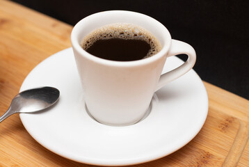 coffee cup with bowl full of toast