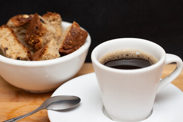 coffee cup with bowl full of toast