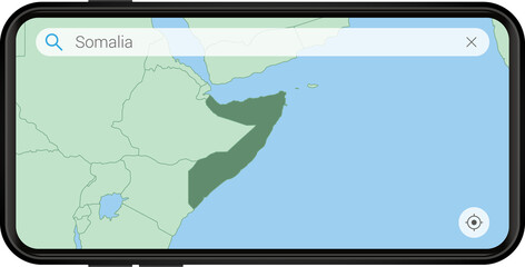 Searching map of Somalia in Cell phone.