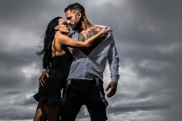 Sexy couple in tender passion. Beautiful sensual woman and sexy man. Sensual couple passionately embracing. Sexy couple lifestyle moment. Lovely man and woman. Young couple in love.