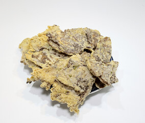 Keripik Paru, a typical Indonesian snack made from beef lung mixed with flour and then fried