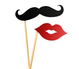 Hand holding paper lips and moustache on wooden sticks, cut out