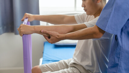 Athlete undergoing physiotherapy with a musculoskeletal specialist after sports and gym injuries.