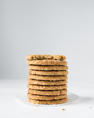 Stack of oat cookies, homemade oatmeal cookies, stack of thin oat biscuits
