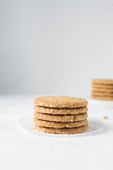Fototapeta na wymiar Stack of oat cookies, homemade oatmeal cookies, stack of thin oat biscuits