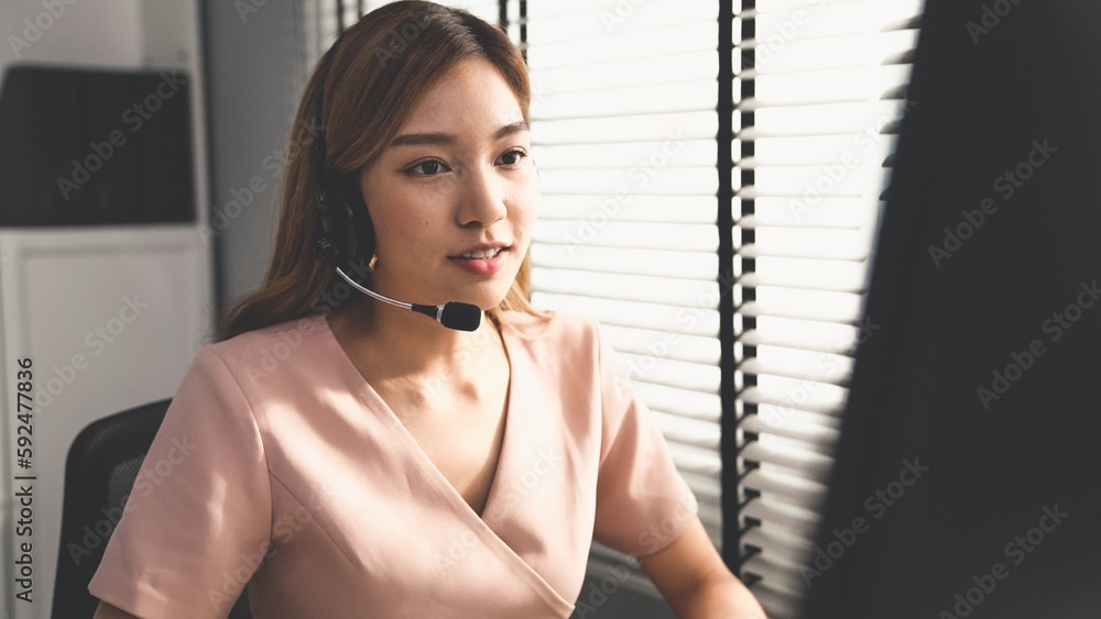 Aufkleber competent female operator working on computer and while talking with clients. concept relevant to bo