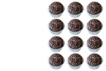 Several Brazilian fudge balls arranged in a rectangle (space copy). Brazilian traditional sweet.