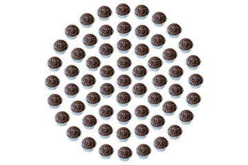 Several Brazilian fudge balls arranged in a perfect circle. Brazilian traditional sweet.