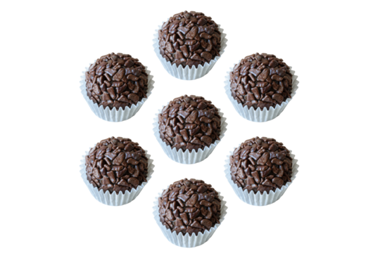 Seven Brazilian fudge balls arranged in a circle. Brazilian traditional sweet.