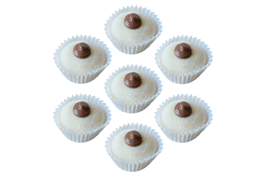 Seven hazelnut cream Brazilian fudge balls arranged in a circle. Brazilian traditional sweet.