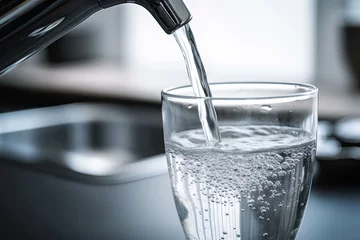 Fotobehang Clear water from kitchen tap in glass. Photo generative AI © pixardi