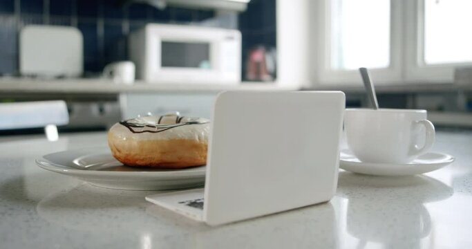 Funny donut as live characters using laptop, amazed face, open mouth, fainted in surprise. Jaw-dropping watching shock morning news content. Shock, surpise emotion concept. Funny shock concept