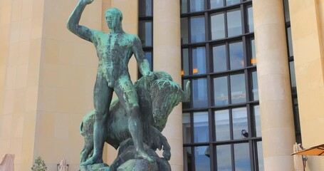 Statue Of Hercules Taming A Bison Positioned On Trocadero Left Wing In Paris, France. close-up, tilt - Powered by Adobe