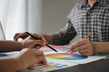 Engineers, graphic artists, architects and painters are meeting to discuss paint textures. The...