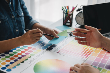 Engineers, graphic artists, architects and painters are meeting to discuss paint textures. The...