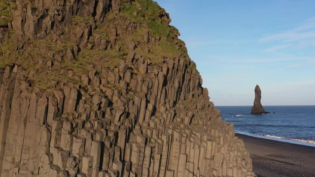 Reynisfjara black sand beach with basalt columns and sea cliffs on the south coast of Iceland