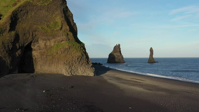Reynisfjara black sand beach with basalt columns and sea cliffs on the south coast of Iceland