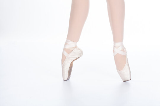 En Pointe CORRECT mid stride Close up of young female ballet dancer showing various classic ballet feet positions pointe shoes