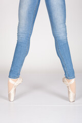 En Pointe CORRECT second position with blue jeans front on teachers perspective Young female ballet dancer showing various classic ballet feet positions blue jeans