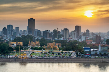 Fototapeta na wymiar Sunset over Phnom Penh and the Royal Palace,viewed from eastern side of Tonle Sap river,Cambodia.