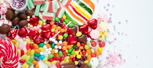 Various sweets assortment. Candy, bonbon, chocholate on white background.