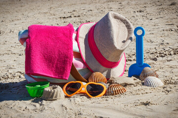Different accessories for relax or sunbathing and children toys for playing on beach. Travel and vacation time