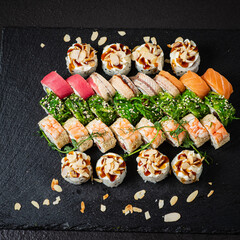 tasty sushi on the black background
