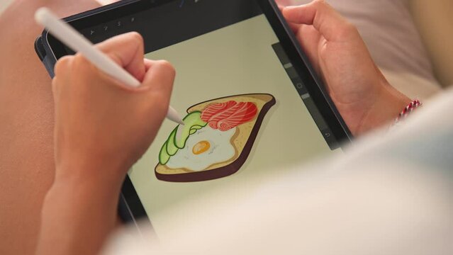 Girl sketch graphic cafe logo close up. Digital illustrator uses stylus. Freelance artist works tablet ipad. Woman paint food image. Designer draw pic pencil. Job skill develop app. Person create art.