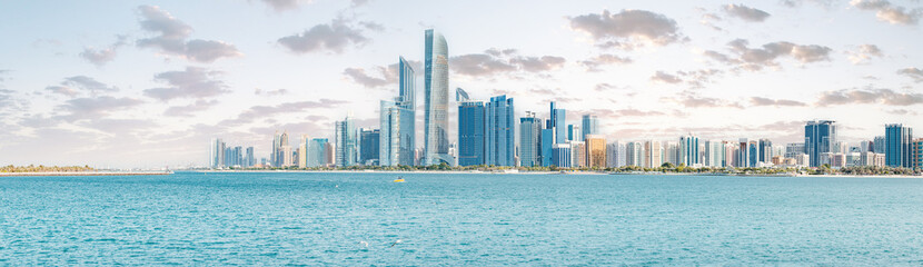 sheer size and scale of Abu Dhabi's towering skyscrapers, a panoramic view that showcases the city's architectural magnificence