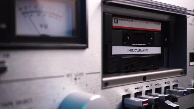 Russian Wiretap Audio Cassette Tape Recording Playing in Vintage Deck Player With VU Meters