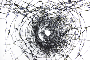 Break through the windshield. Broken glass with a hole from a firearm.