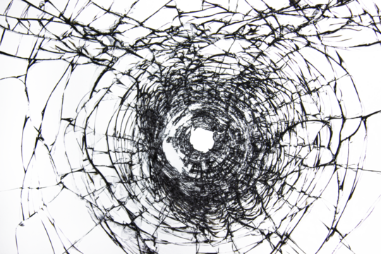 Break through the windshield. Broken glass with a hole from a firearm. - Powered by Adobe