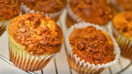 A few muffins on a stainless steel stand, a Colombian favorite