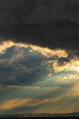 Fototapeta premium Pipes of a nuclear power plant on the background of a dramatic sky