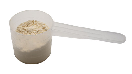 Whey protein powder in a measuring spoon isolated on white background.