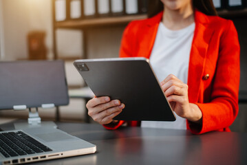 businesswoman hand working with new modern computer using on smartphone and tablet as concept..