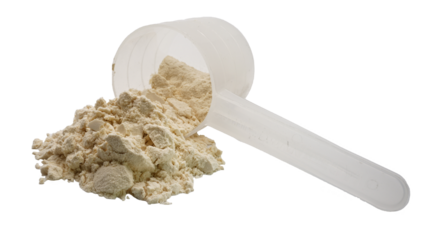 Whey protein powder in a measuring spoon isolated on white background.