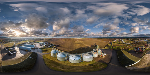 full seamless 360 hdri panorama over rows of agro silos granary elevator with seeds cleaning line...