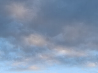 lovely fluffy white clouds in the sky above Sydney NSW Australia at sunset