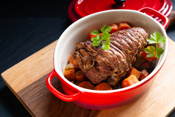 Food concept homemade organic Veal Pot Roast Braised on black background with copy space