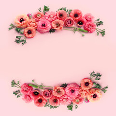 Top view image of pink flowers composition over pastel background
