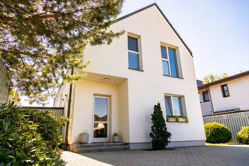 Outside view of a simple private contemporary house in a residential district