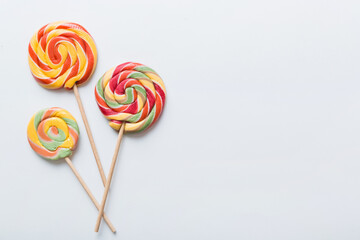 Set of colorful lollipops on colored background. Summer concept. Party Happy Birthday or Minimalist Concept