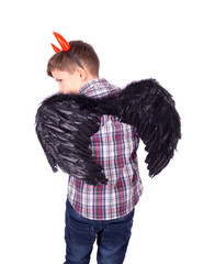 Little boy with a devil costume - 592568238