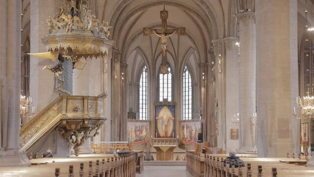 Interior Of Linkoping Cathedral With The Pulpit And Altar In Sweden. - wide